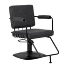 Poltrona da parrucchiere Gabbiano Katania Loft in nero con base quadrata e braccioli imbottiti