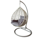 Poltrona sospesa in rattan con piedistallo - RELAXA